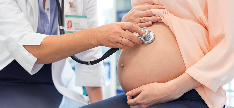 Doctor Examining Pregnant Woman