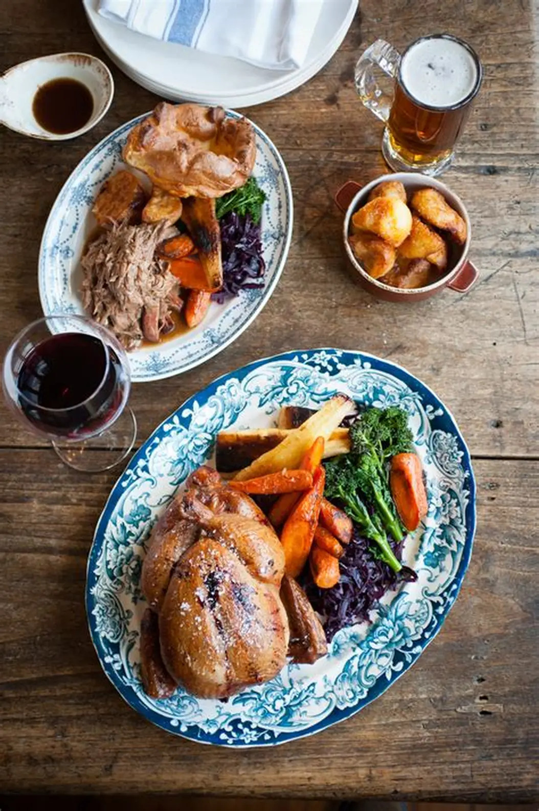 A close-up of a succulent meat dish, showcasing the rich flavors at Temper.
