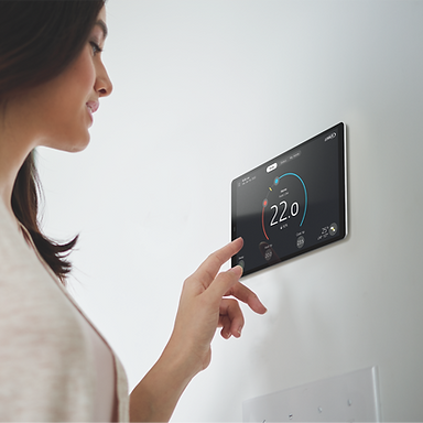 An HVAC certified technician repairing the Air Conditioning