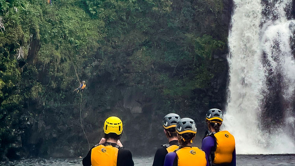 Rappelling alongside the largest of the Umauma Triple-Tier