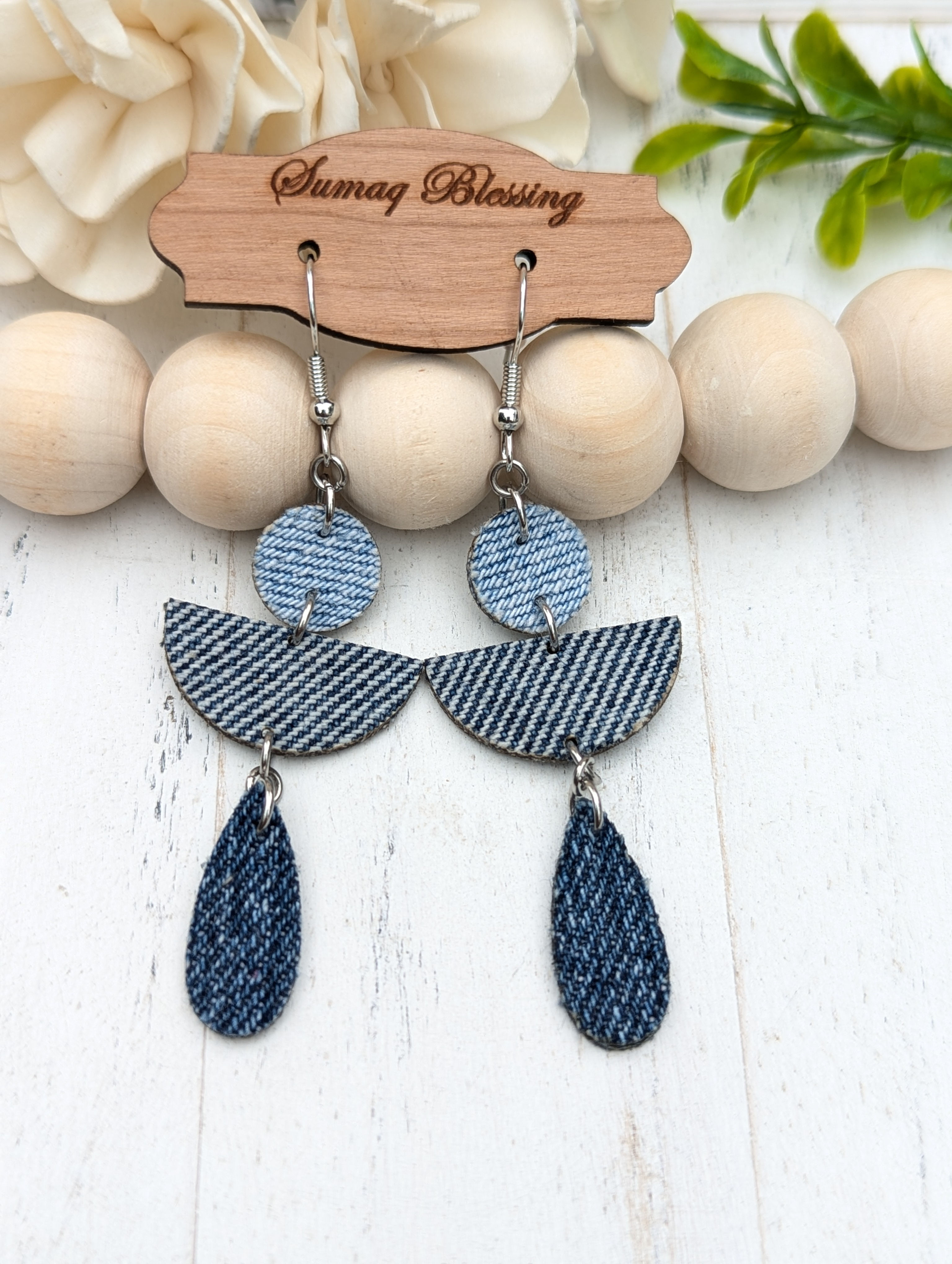 eaturing a chic geometric design crafted from repurposed denim fabric, these lightweight earrings are perfect