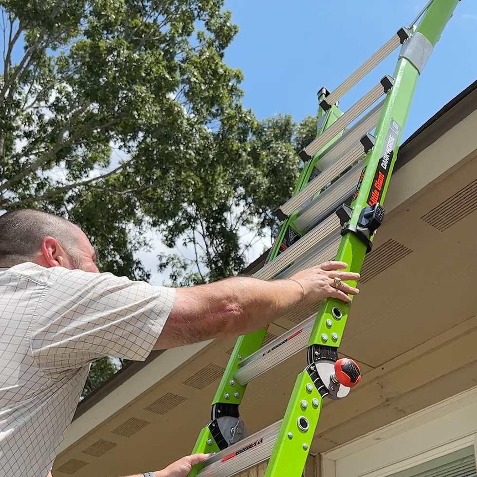 Eye-level view of a home inspector examining a roof