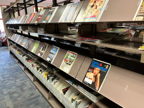 Shelves with magazines.