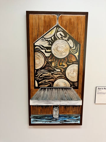 A piece of art made from rough textiles.