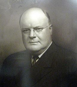 A black and white photrograph portrait of Edgar B. Davis.