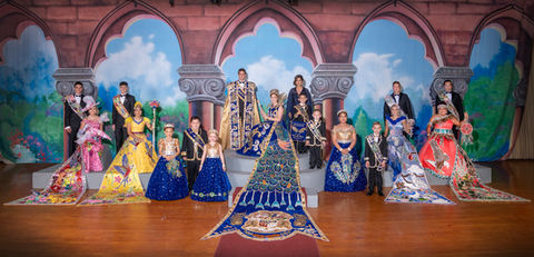 Royalty for San Antonio's Fiesta dressed in traditional beaded gowns and trains.
