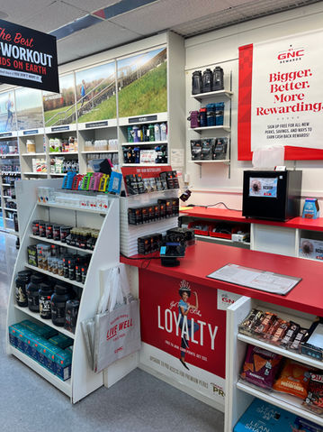 Shelving displaying products inside a GNC store