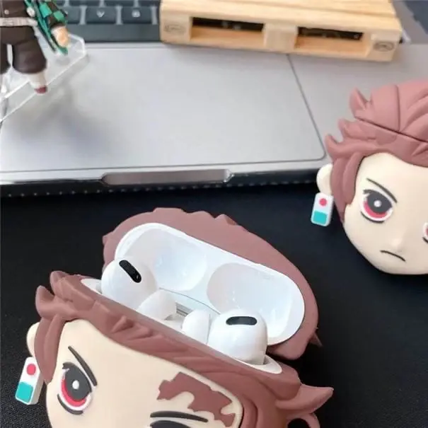 Thumbnail: Headphone case with Tanjiro anime character design and white AirPods inside