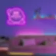 Thumbnail: Pink Kirby neon sign, sofa, shelf, artistic lighting, decorative room, interior design