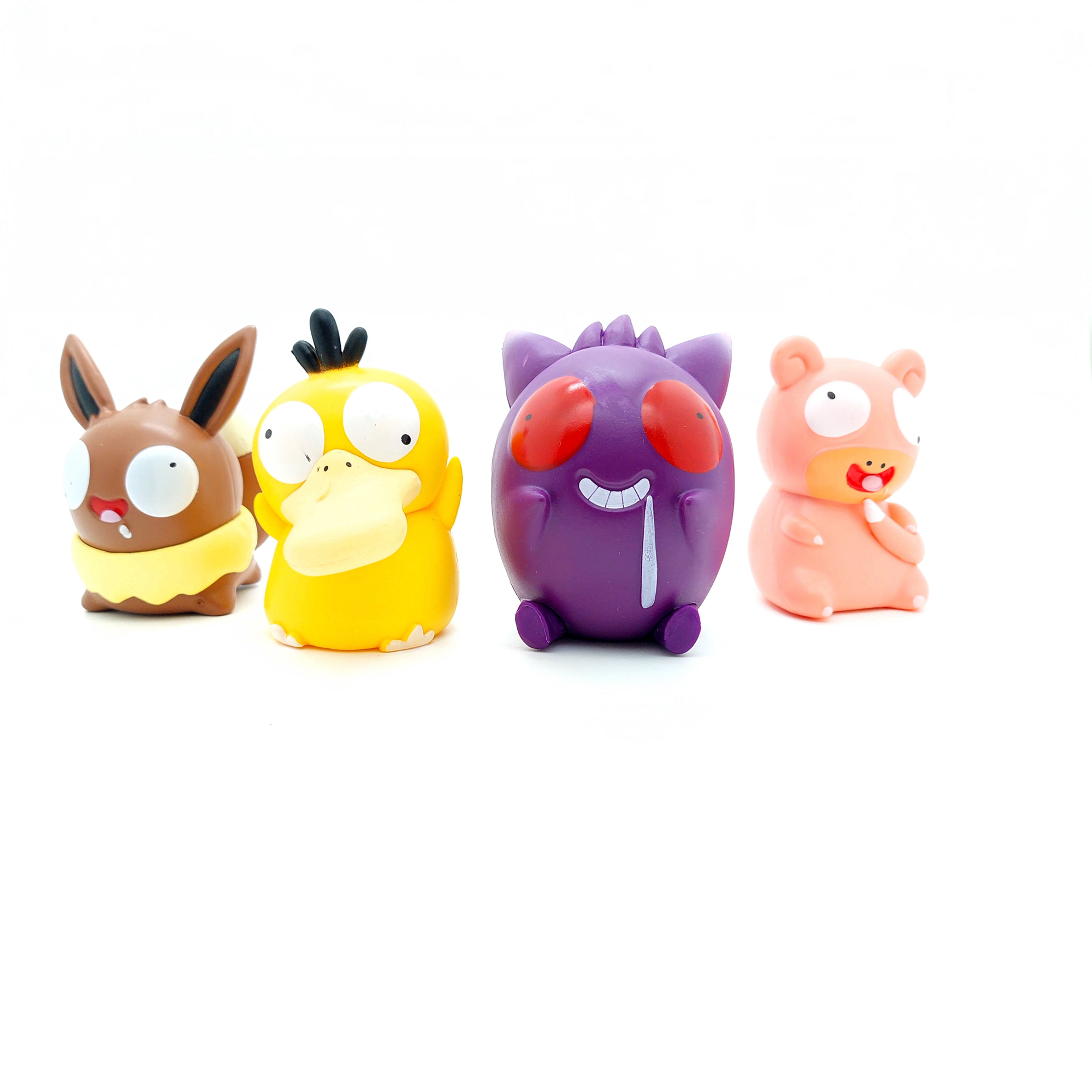 Four colorful Pokemon figures isolated on white background, various expressions.