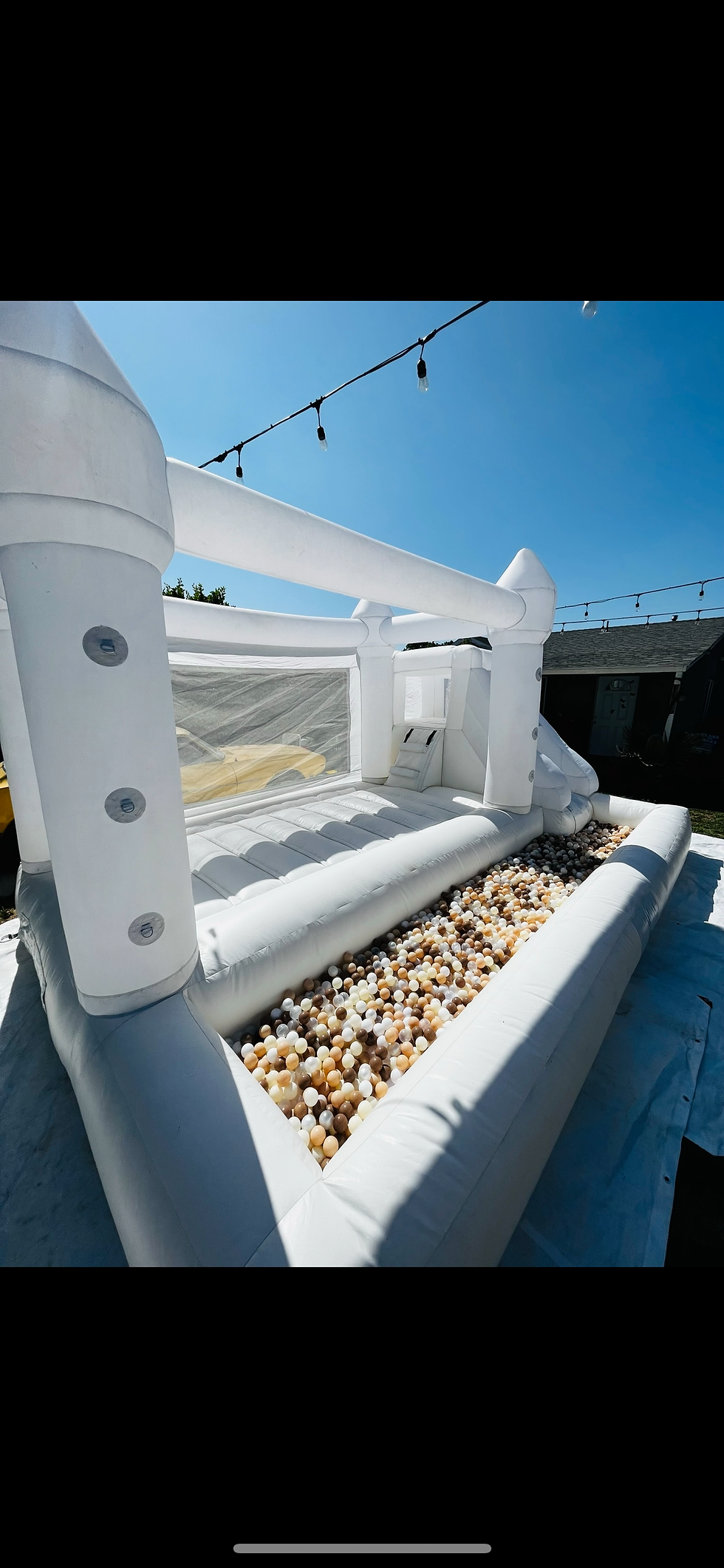 Thumbnail: white castle, bounce house combo