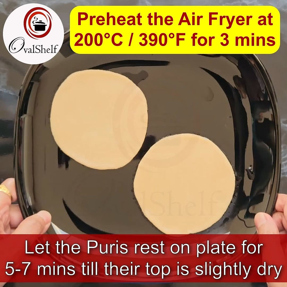 Healthy Puri - Method 11: Two puris cooked in hot water on a black plate with hands holding it.