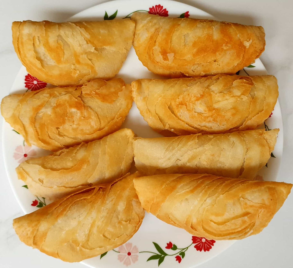 Multiple Layered Karanji or Gujiya in a plate