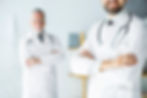 crop-young-doctor-standing-office.jpg