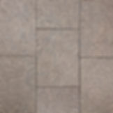 A close up of Umbria Granite pattern flagging pavers laid in an offset pattern to break the joint. Umbria is taupe colored