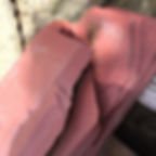 Thumbnail: A wooden pallet filled with random sizes and misshapen pieces of Vermont Slate, natural stone all red in color