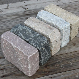 Thumbnail: 10"x7"x4" granite cobblestones shown in four different colors, a yellow, black, pink, and grey granite colors.