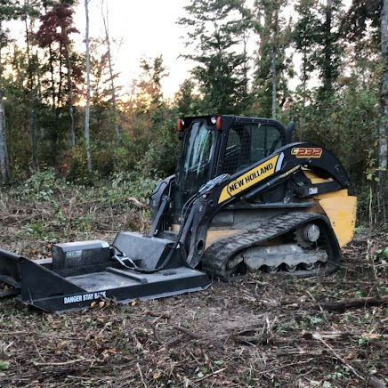 new holland skid steer with brush hog attachment