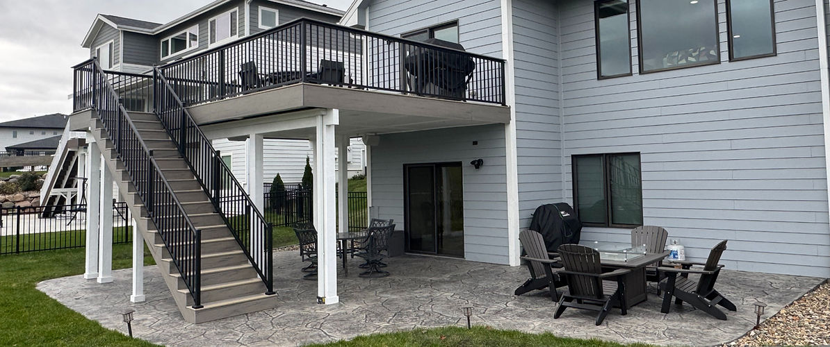 Composite deck in Clive, IA with finished ceiling and waterproof system (2024)