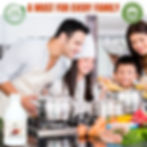 Thumbnail: This image shows a happy family cooking together in a bright kitchen, including a man, woman, and two children, one of whom is wearing a chef's hat. They are gathered around a stove with pots and ingredients, smiling and enjoying the moment. A bottle of La Fleshol Chicken, Meat, and Fish Wash is displayed in the lower-left corner, and text at the top reads "A Must for Every Family" along with eco-friendly and 100% natural product seals, promoting the product as a safe and essential addition to healthy family meals.