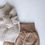 Thumbnail: Baby brown ribbed leggings and stone knitted sweater