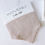 Thumbnail: Neutral muslin baby bibs set of two