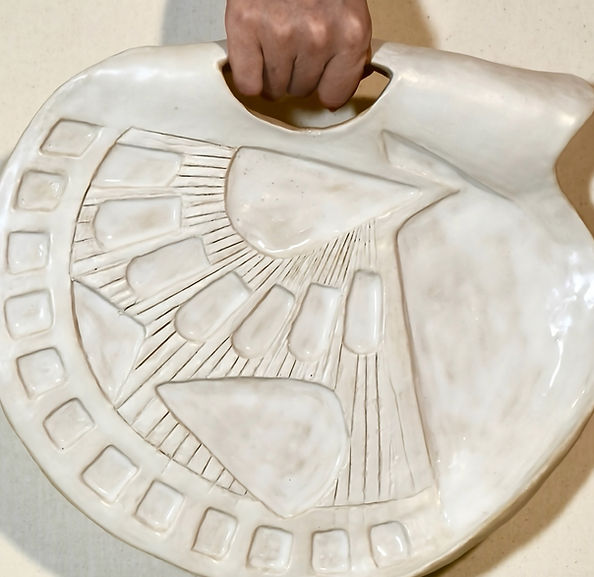 Ceramic paitning pallette created for this project, exploring material, body and beauty.