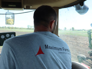 Farmer Clark Warner in tactor cab during planting season
