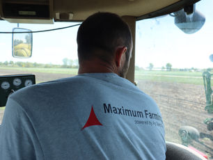 Farmer Clark Warner in tactor cab during planting season