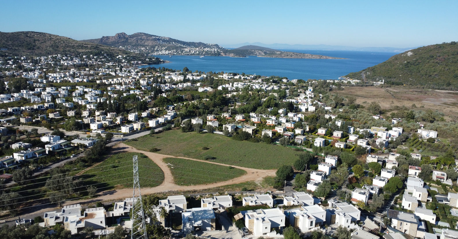 Panoramic view of Bodrum coastline and residential area.