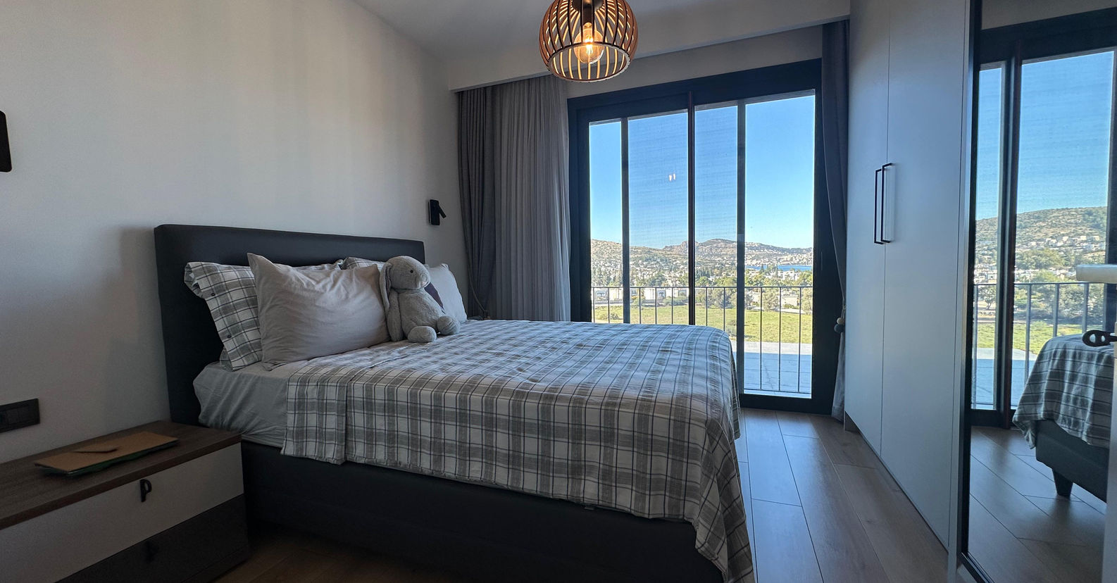 Spacious bedroom with garden access and elegant design in Bodrum.