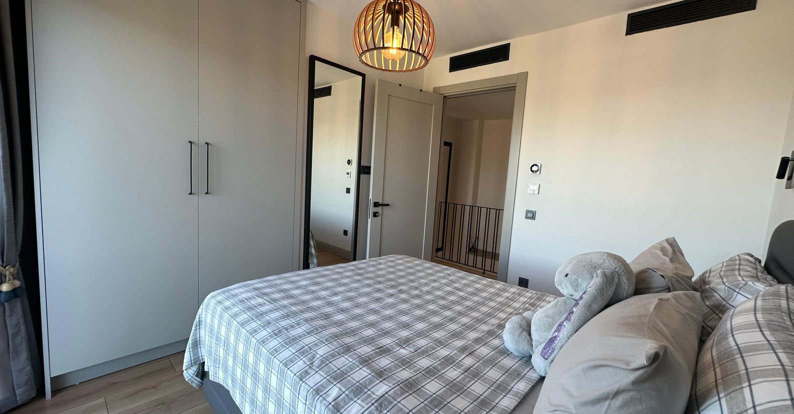 Bright bedroom with sea view and luxury finishes in Bodrum villa.