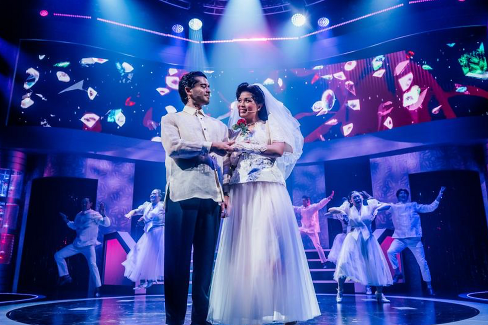 From left: Chris Renfro, Reanne Acasio, and the company of “Here Lies Love” at the Mark Taper Forum (Photo by Jeff Lorch)