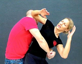 3-ple elbow release from back hug