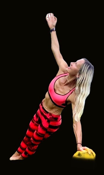 pink outfit side plank on the bal