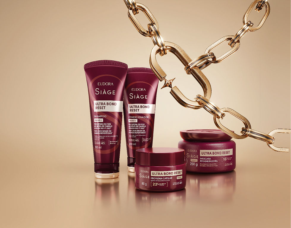 Linha Eudora Siàge Ultra Bond Reset: shampoo, condicionador, máscara e proteína capilar sobre fundo bege com corrente dourada.