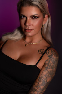 High-end close-up studio portrait with purple gel background – unique editorial style headshot by Dawn V Gilmore VIP Photography Mississippi