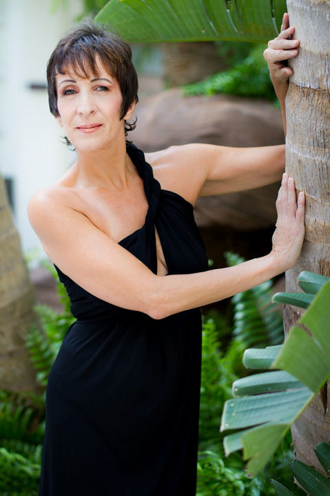 Elegant image of a woman 60+ highlighting confidence, sophistication, and high-end portrait artistry on the Mississippi Gulf Coast