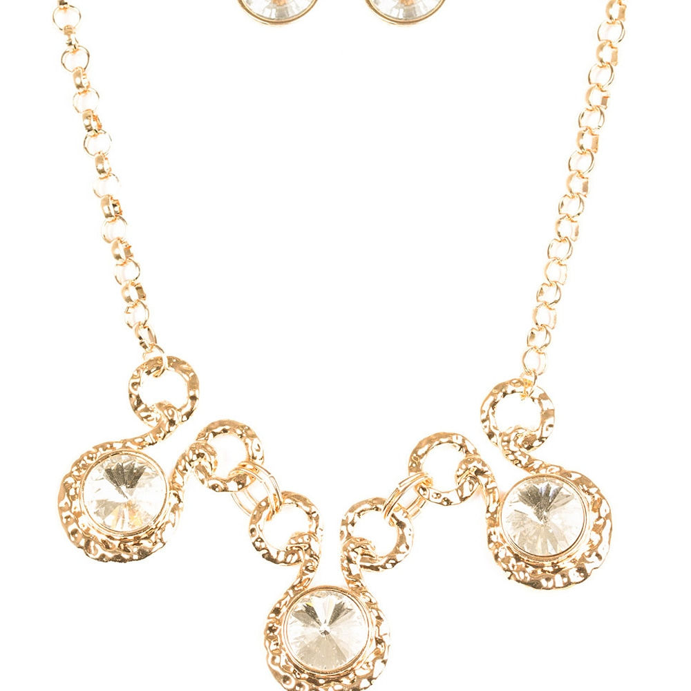 Oversized Gems Encrusted in a Gold Frame