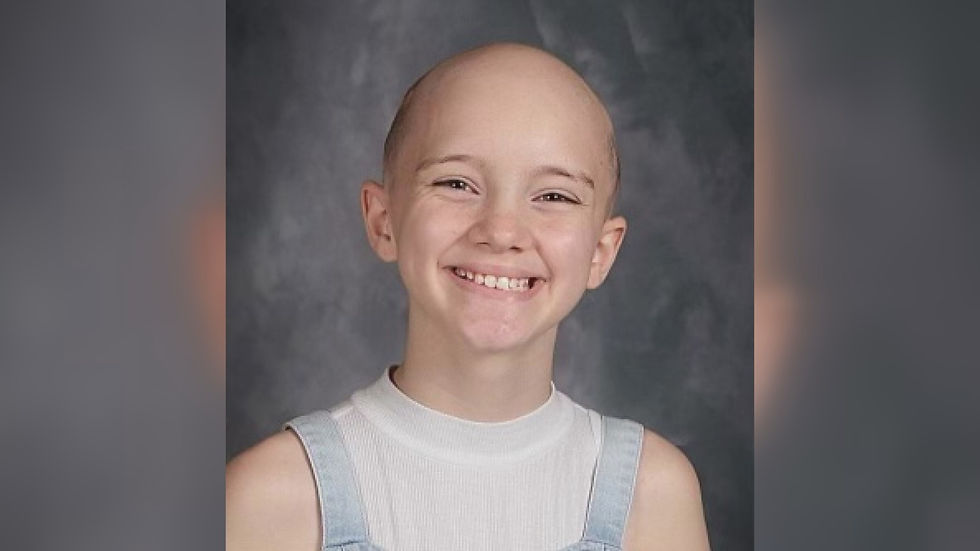 12-year-old Rio Allred smiling.