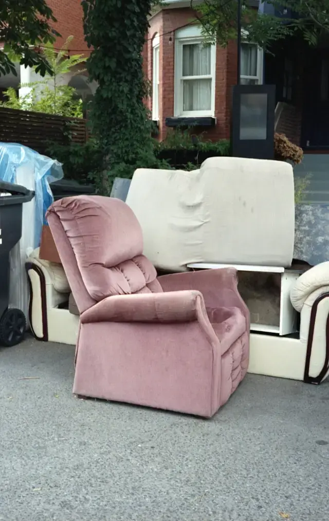 High angle view of a large dumpster filled with sorted recyclable materials