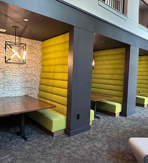 Commercial banquette seating upholstery for a hospitality venue featuring custom upholstered booths and premium furniture upholstery craftsmanship in Atlanta, GA.