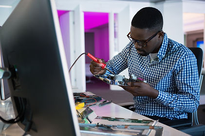 it technican fixing a computer