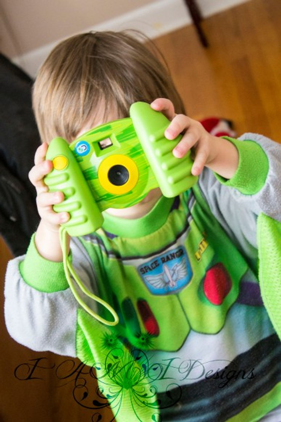 {A Little Green In His Camera}
