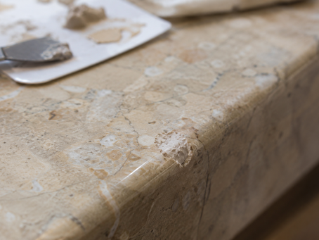Close view of a colour-matched repair in natural stone.