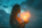 Silhouetted woman holds a glowing heart of light at dusk, with blue clouds and floating sparks creating a dreamy mood