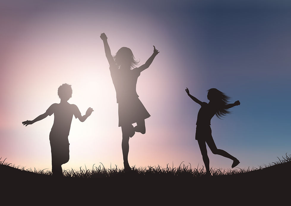 shadow silhouettes of 3 kids jumping