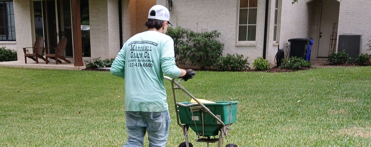 Marshall Grain team member applying fertilizer.