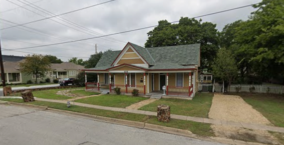 Street view of a Grapevine, Texas home before the 2020 front yard landscape redesign.