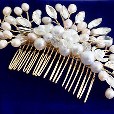 bridal hair comb with white fresh water pearls clear rhinestones and crystal beading on a gold color wire base comb